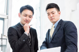 iPad 二人のビジネスマン